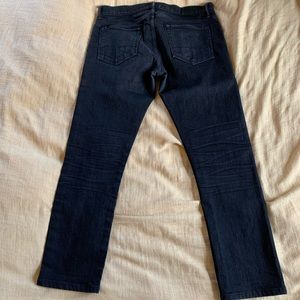 Tom Ford black slim fit selvedge denim jeans.